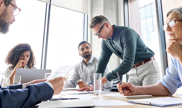 An executive team holds a crisis meeting